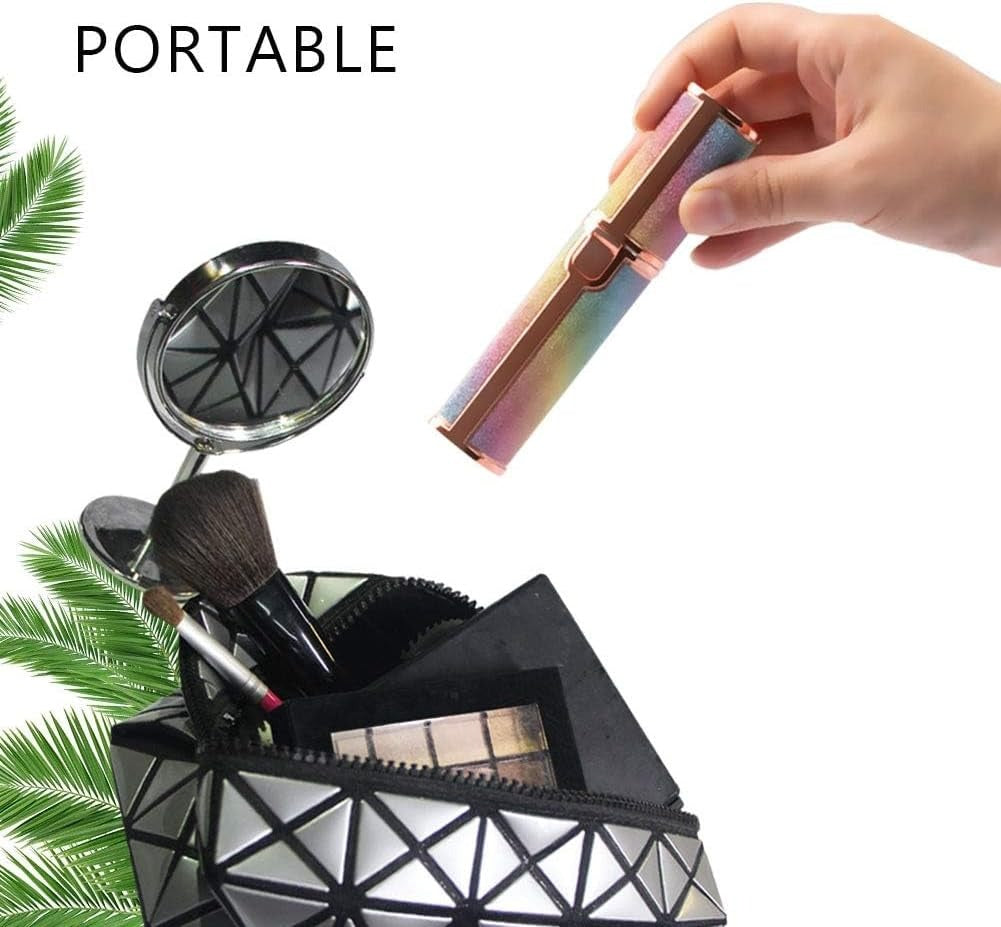 Close-up of rechargeable eyebrow trimmer in hand.