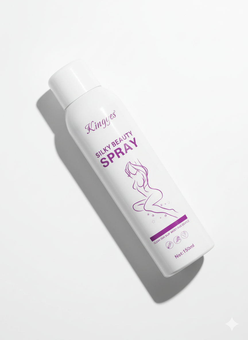 The Silky Beauty spray bottle next to a floral arrangement for a gentle feel.
 زجاجة بخاخ Silky Beauty بجانب تنسيق زهور لإضفاء شعور باللطف.