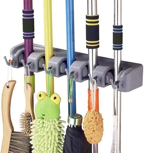 Brooms and toiletries organizer for efficient storage and space-saving home cleaning supply arrangement