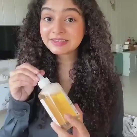 Demonstration of applying Glycolic Acid Original exfoliating solution in skincare routine